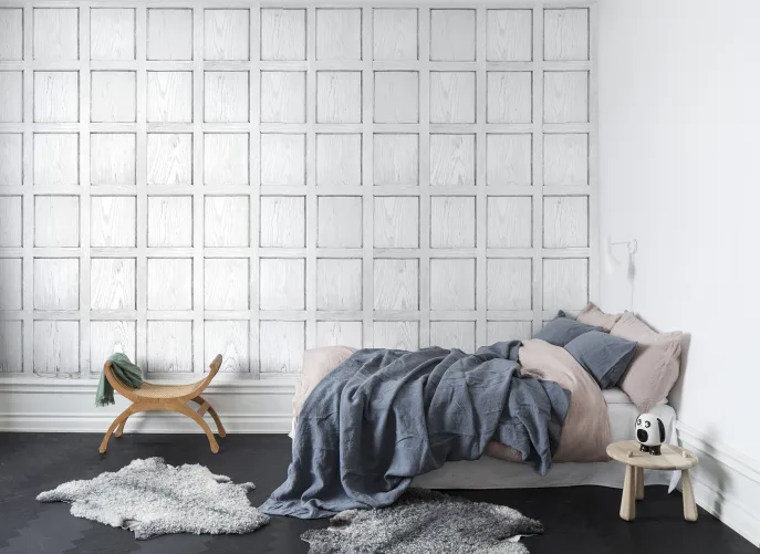 Witte 3D muurschildering die eruitziet als houten panelen