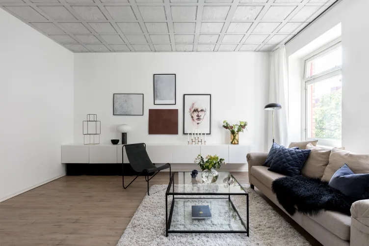 Witte 3D muurschildering die eruitziet als houten panelen