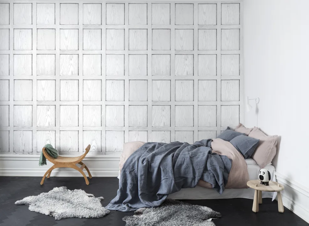 Vit 3D-tapet som ser ut som träpanel