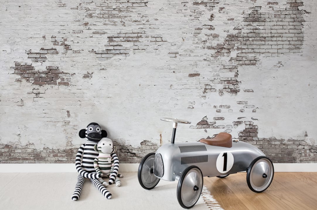 This white brick wall mural adds industrial charm to any room