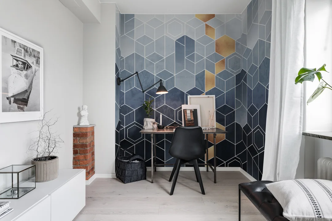 Art Deco wall mural in shades of blue with a golden twist