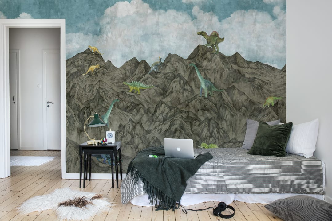 Bergige Tapete mit eindrucksvollen Dinosauriern