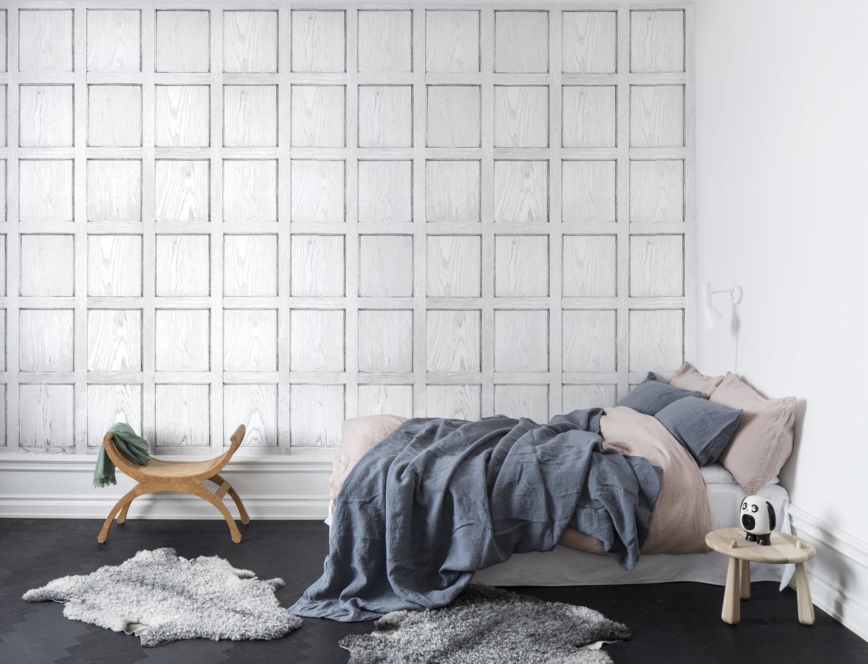 Witte 3D muurschildering die eruitziet als houten panelen