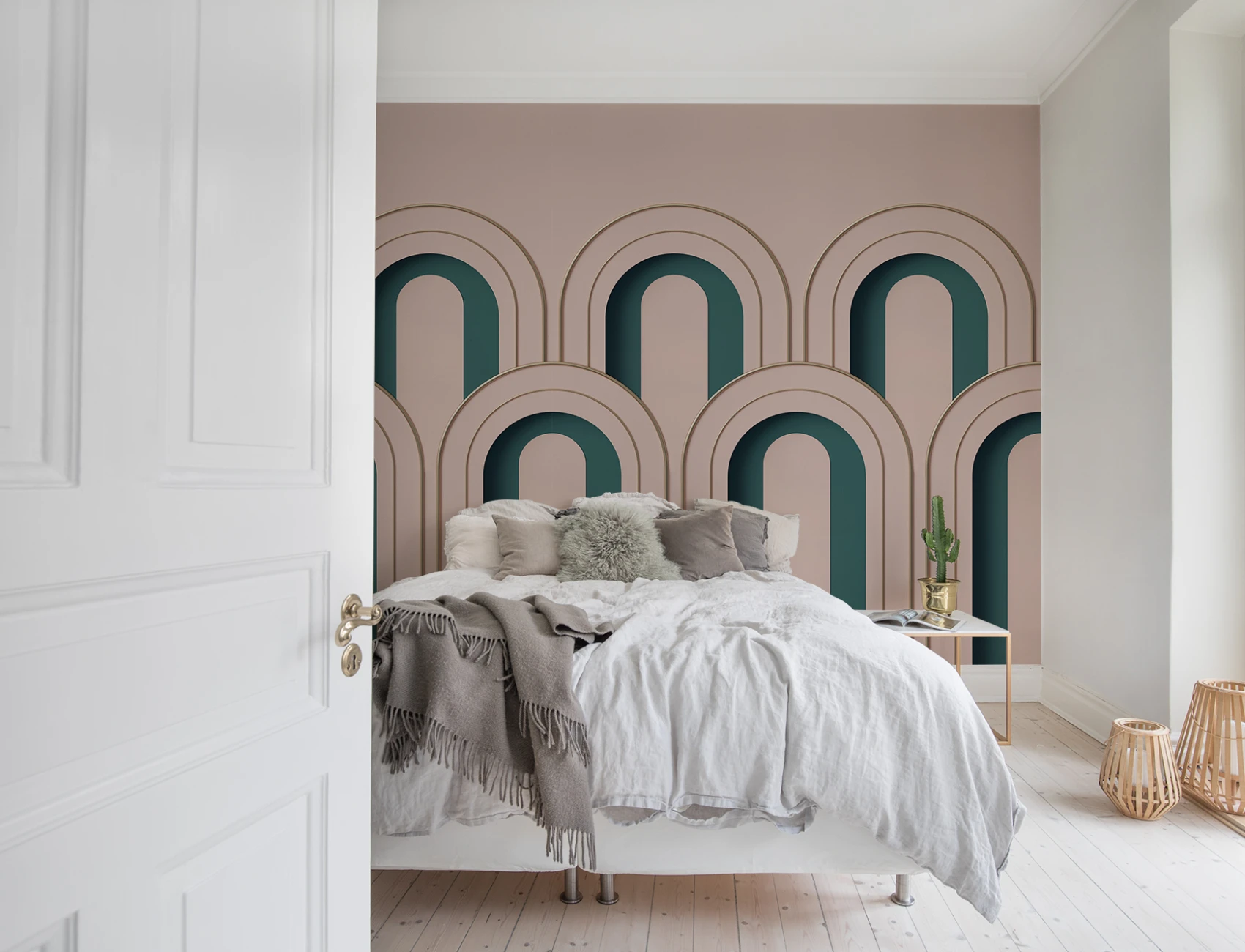 A 3D wall mural in dusty pink adds depth to any room