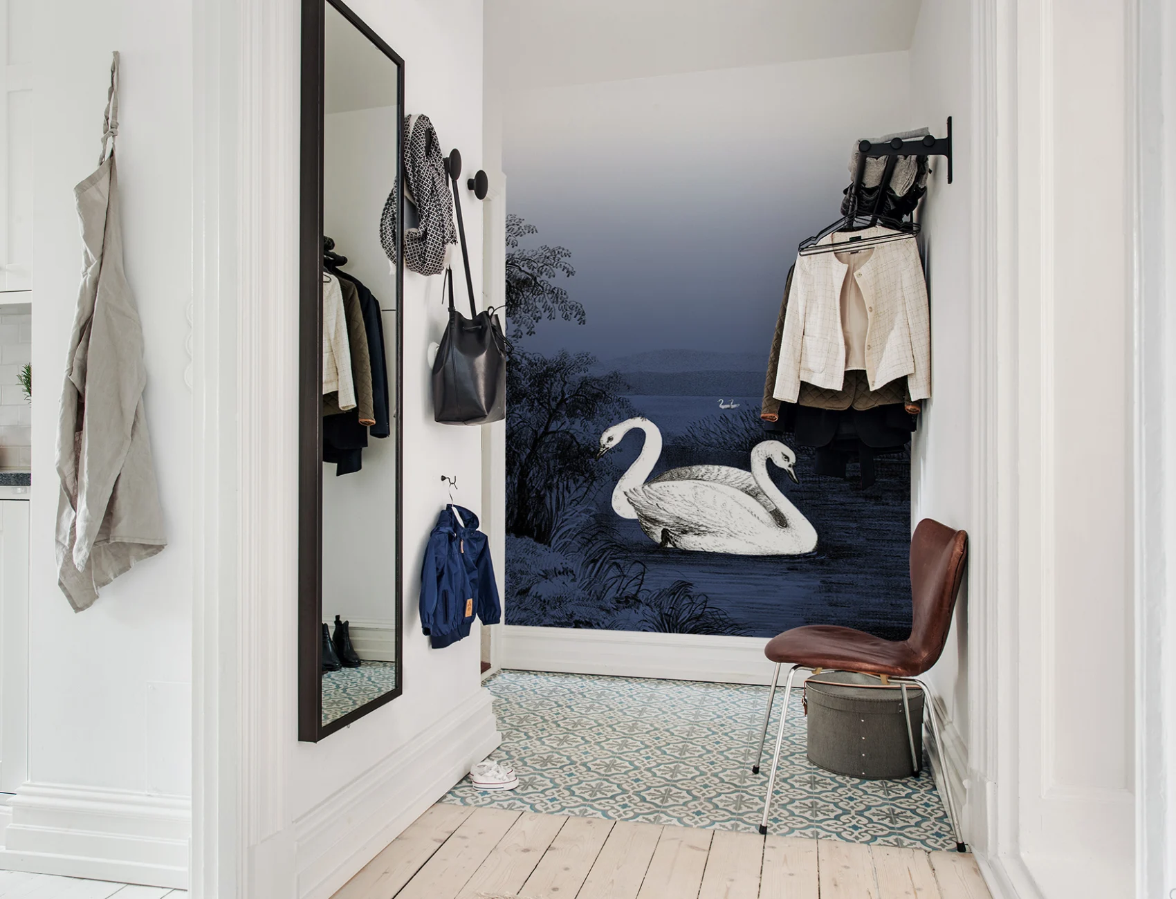 Swans in the midnight blue twilight