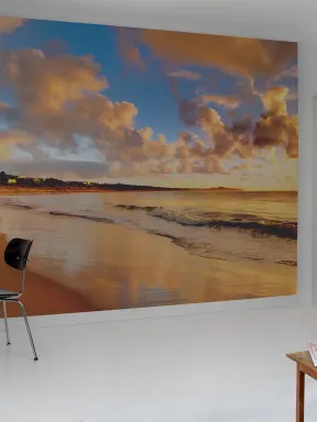 Tapet med solnedgång på stranden