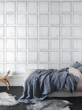 Vit 3D-tapet som ser ut som träpanel