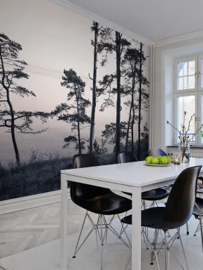 Wall mural with photo of pine trees in pink and gray hues