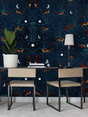 Papel de parede com macacos numa paisagem lunar