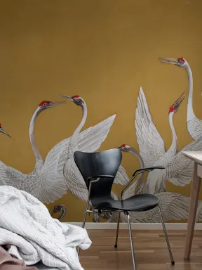 Kraanvogels op gele achtergrond
