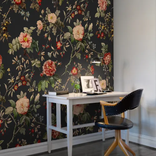 Red flowers and green leaves on dark vintage wallpaper