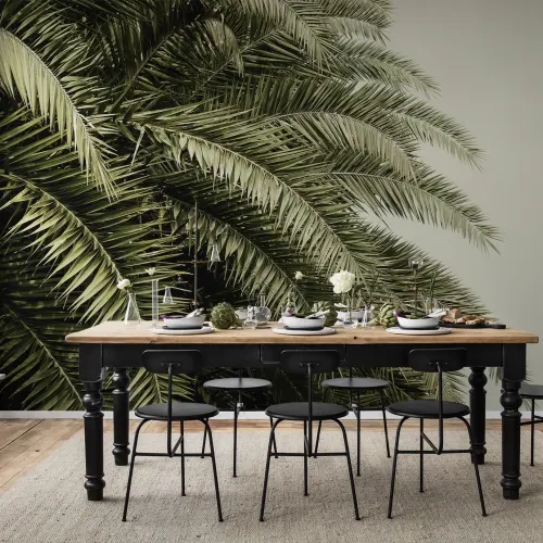 Create a lush green oasis with jungle motif wall mural
