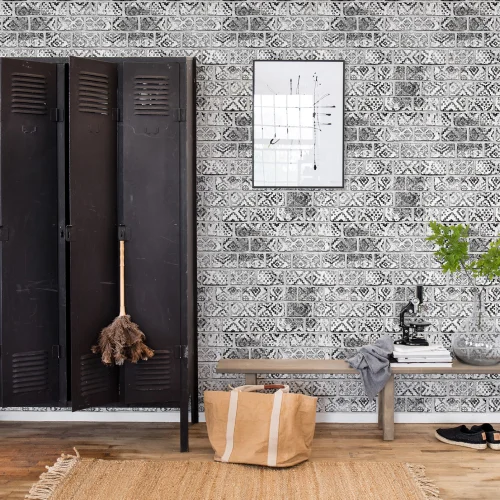 Un mur de briques noires et blanches avec des jolis détails