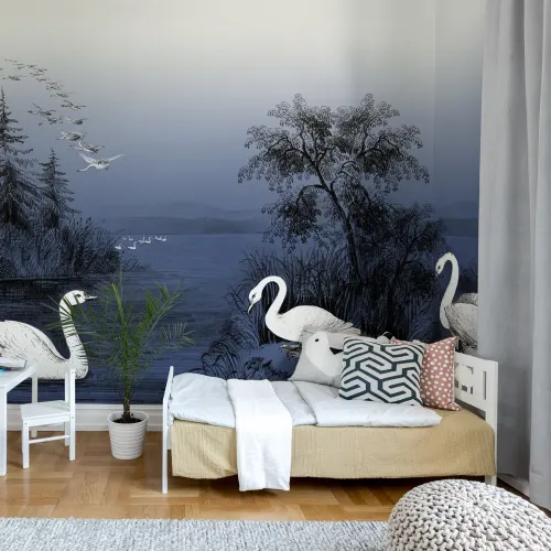 Swans in the midnight blue twilight